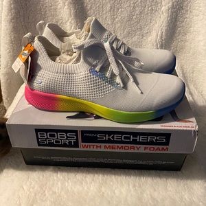 White Skechers gym shoes